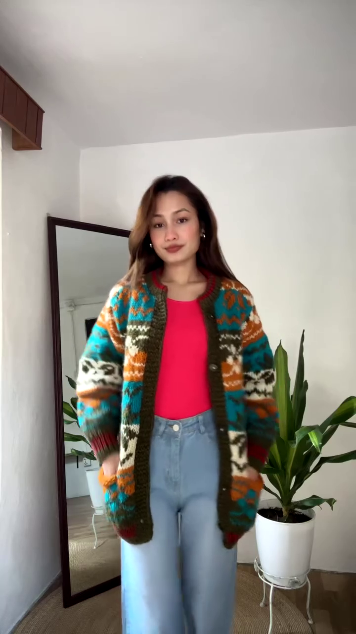 Multicolor Patterned Knit Cardigan 🧥🌈 – Styled Over Red Top & Light Blue Jeans