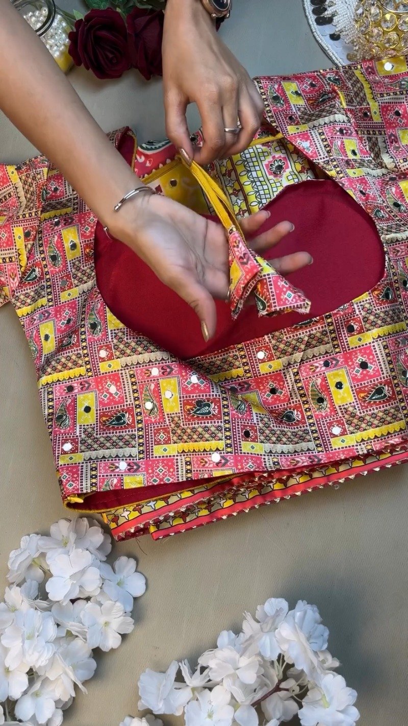 Vibrant Rajasthani Bandhani Inspired Mirror-Work Blouse and Lehenga Set