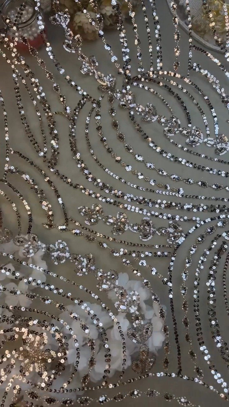 Opulent Champagne Shimmer Sequin-Embellished Net Saree – A Masterpiece of Glitz