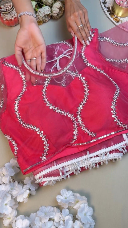 Rosy Radiance Sequinned Net Saree with Embellished Blouse