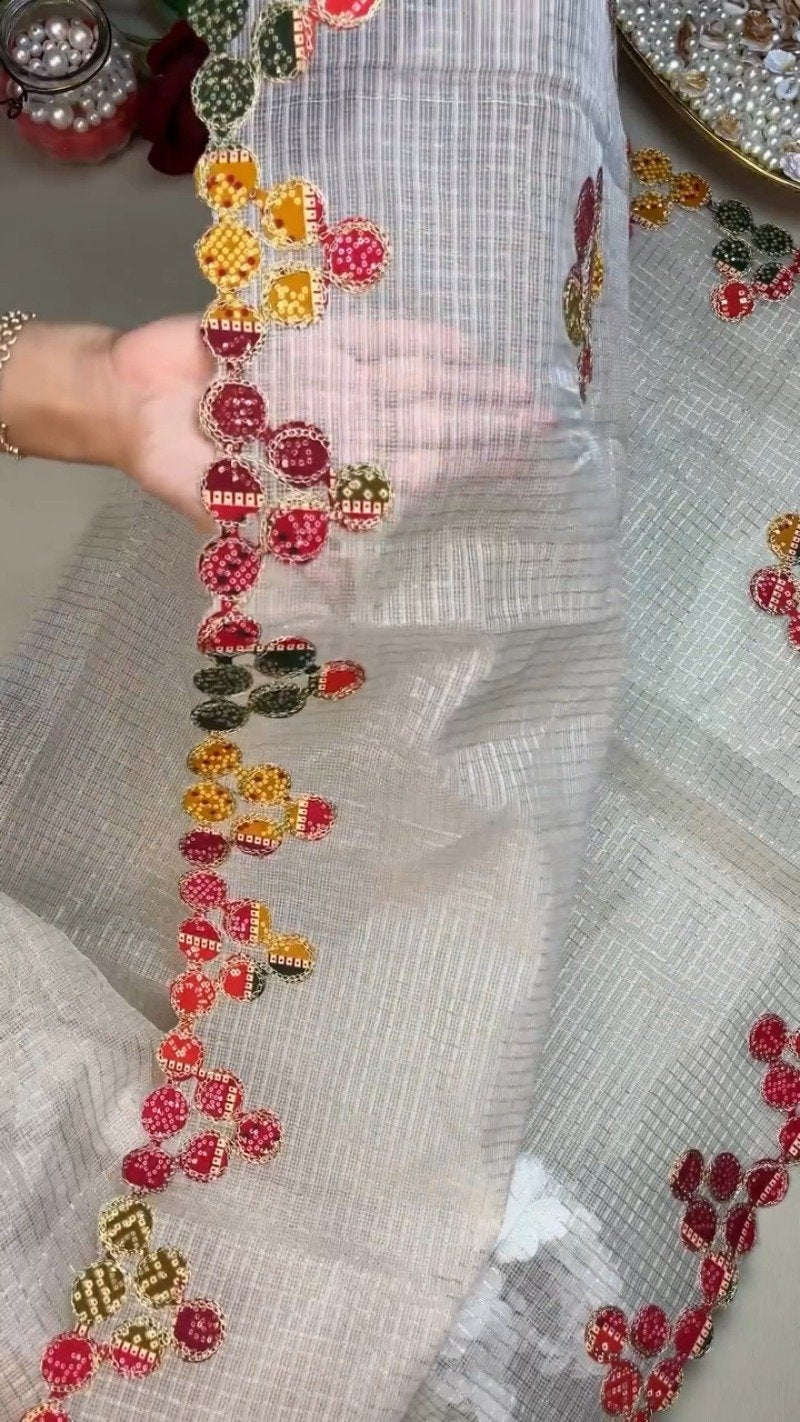 Timeless Bandhani Elegance: White Handloom Saree with Deep Maroon Blouse – Available in One Colour Variant