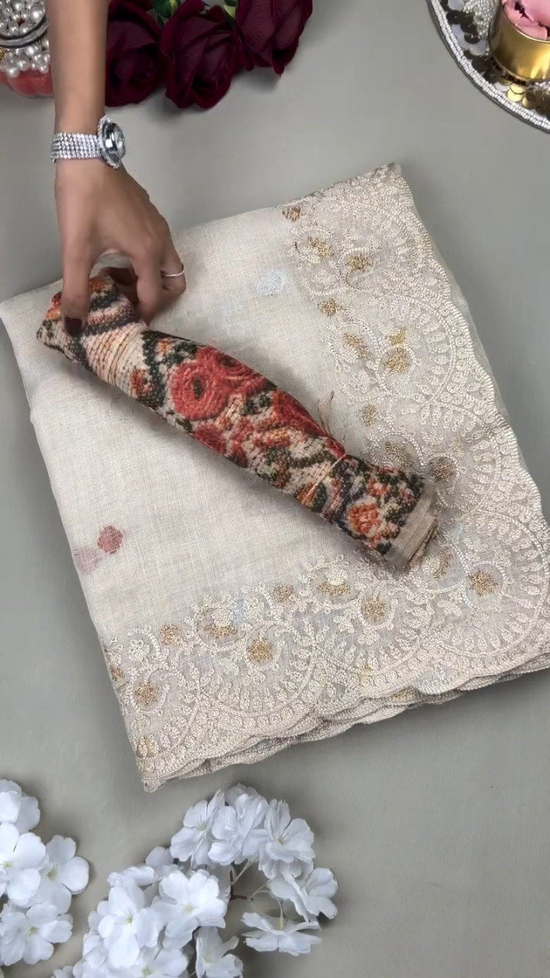 Ethereal Cream Floral Embroidered Linen Saree – A Masterpiece of Grace