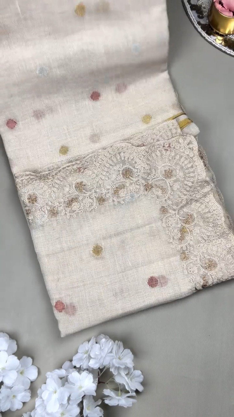 Ethereal Cream Floral Embroidered Linen Saree – A Masterpiece of Grace