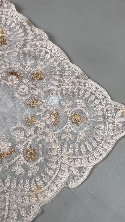 Ethereal Cream Floral Embroidered Linen Saree – A Masterpiece of Grace