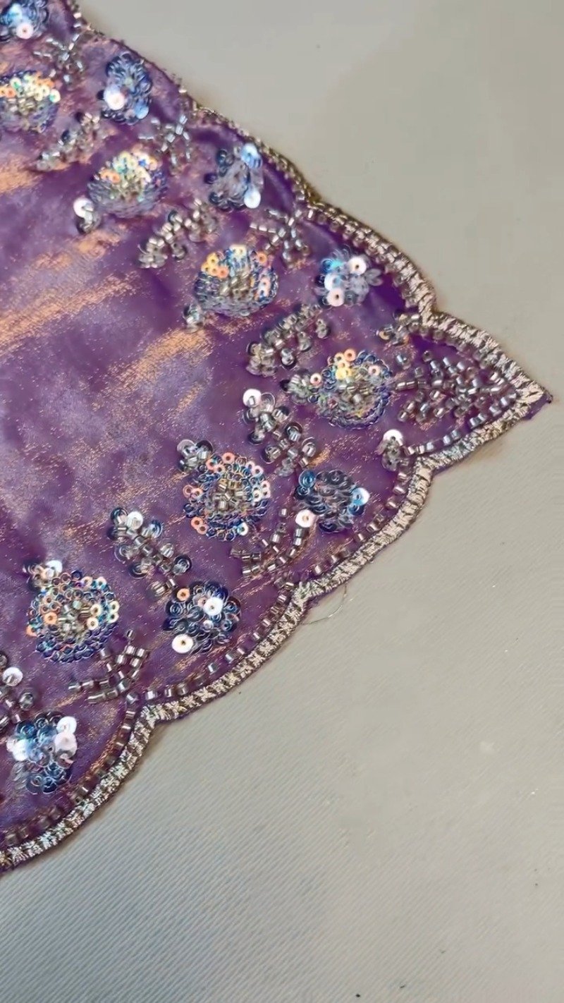 Enchanting Lavender Organza Saree with Intricate Sequin Embellishments