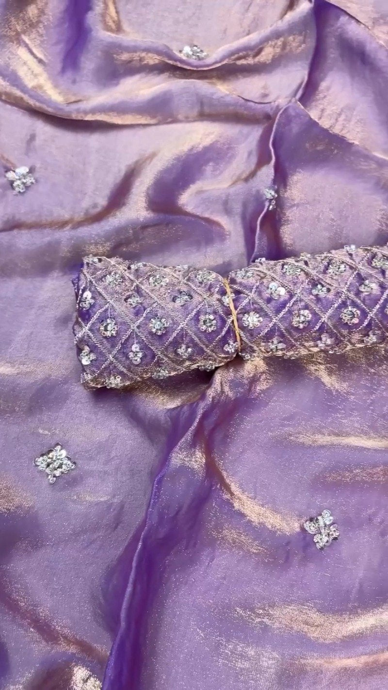 Enchanting Lavender Organza Saree with Intricate Sequin Embellishments