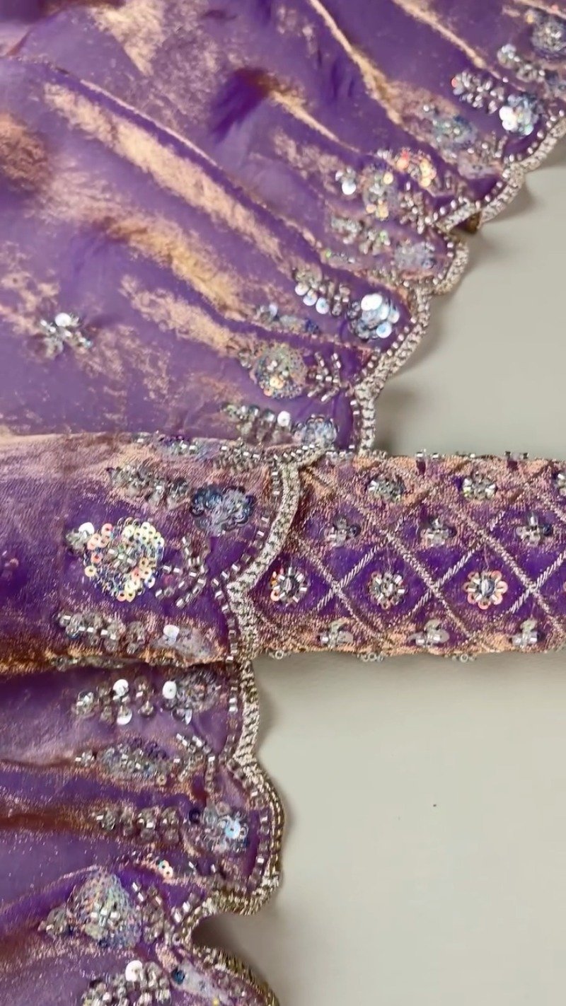 Enchanting Lavender Organza Saree with Intricate Sequin Embellishments
