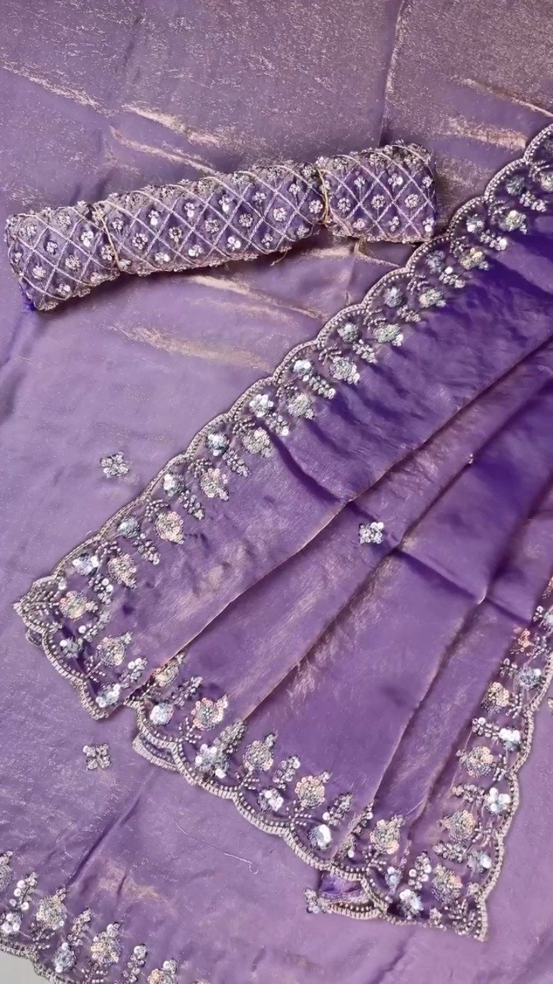 Enchanting Lavender Organza Saree with Intricate Sequin Embellishments