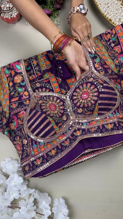 Royal Plum Embroidered Silk Lehenga Choli Set with Intricate Floral & Paisley Detailing