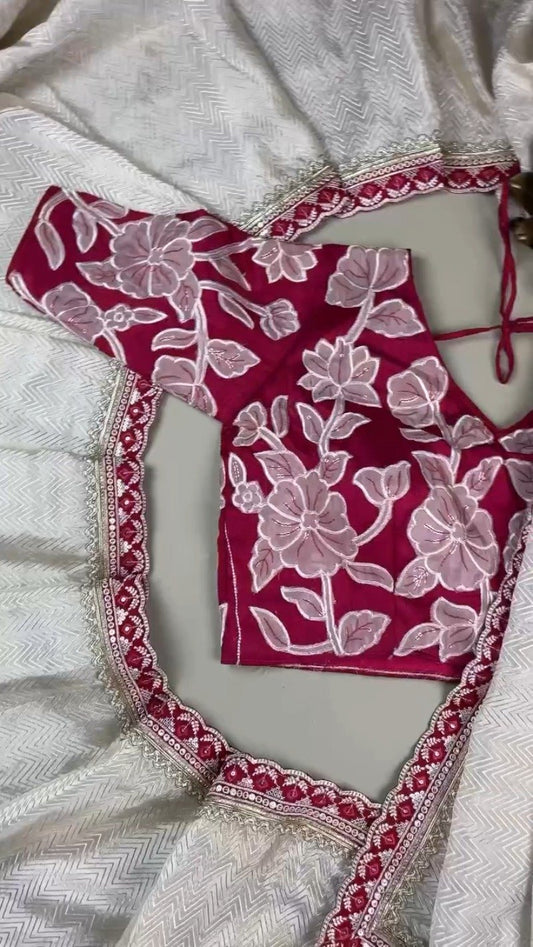Ivory Chevron Pattern Saree with Embellished Deep Magenta Blouse – Elegant Festive Drape