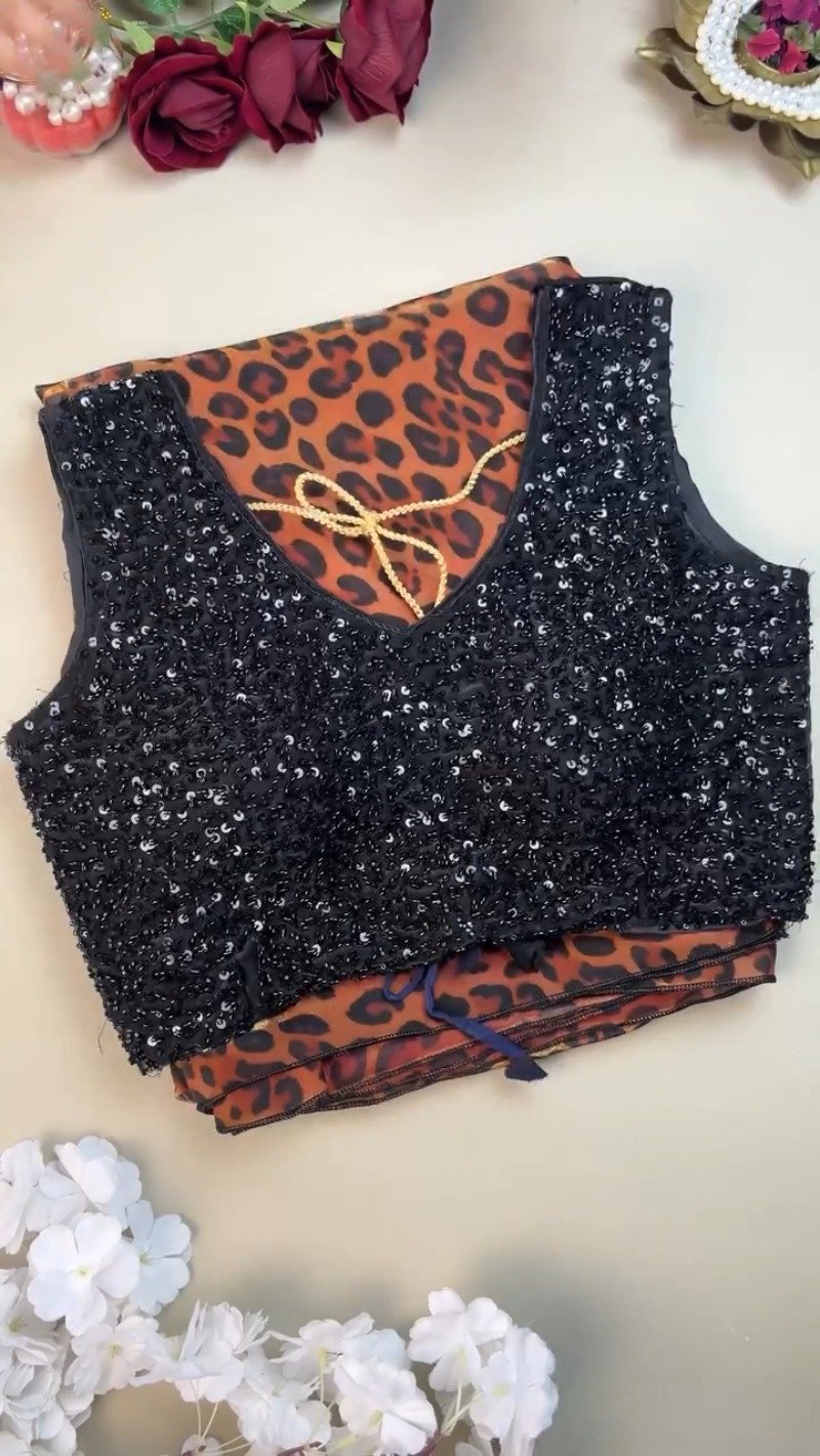 Sultry Leopard Print Organza Saree with Embellished Sequin Blouse