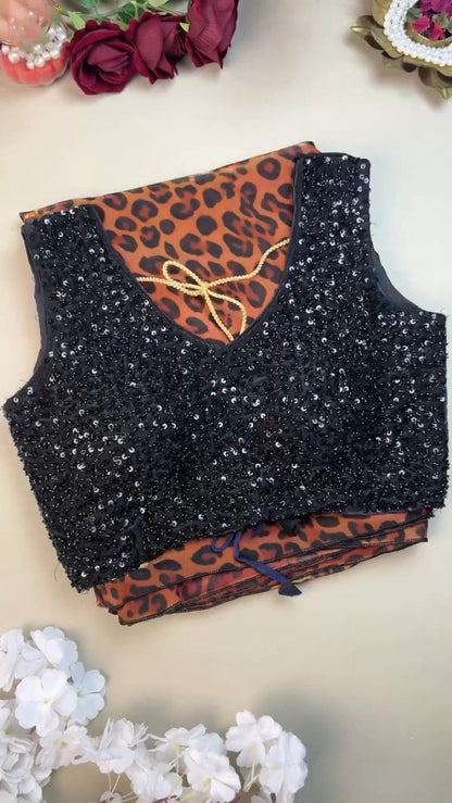 Sultry Leopard Print Organza Saree with Embellished Sequin Blouse