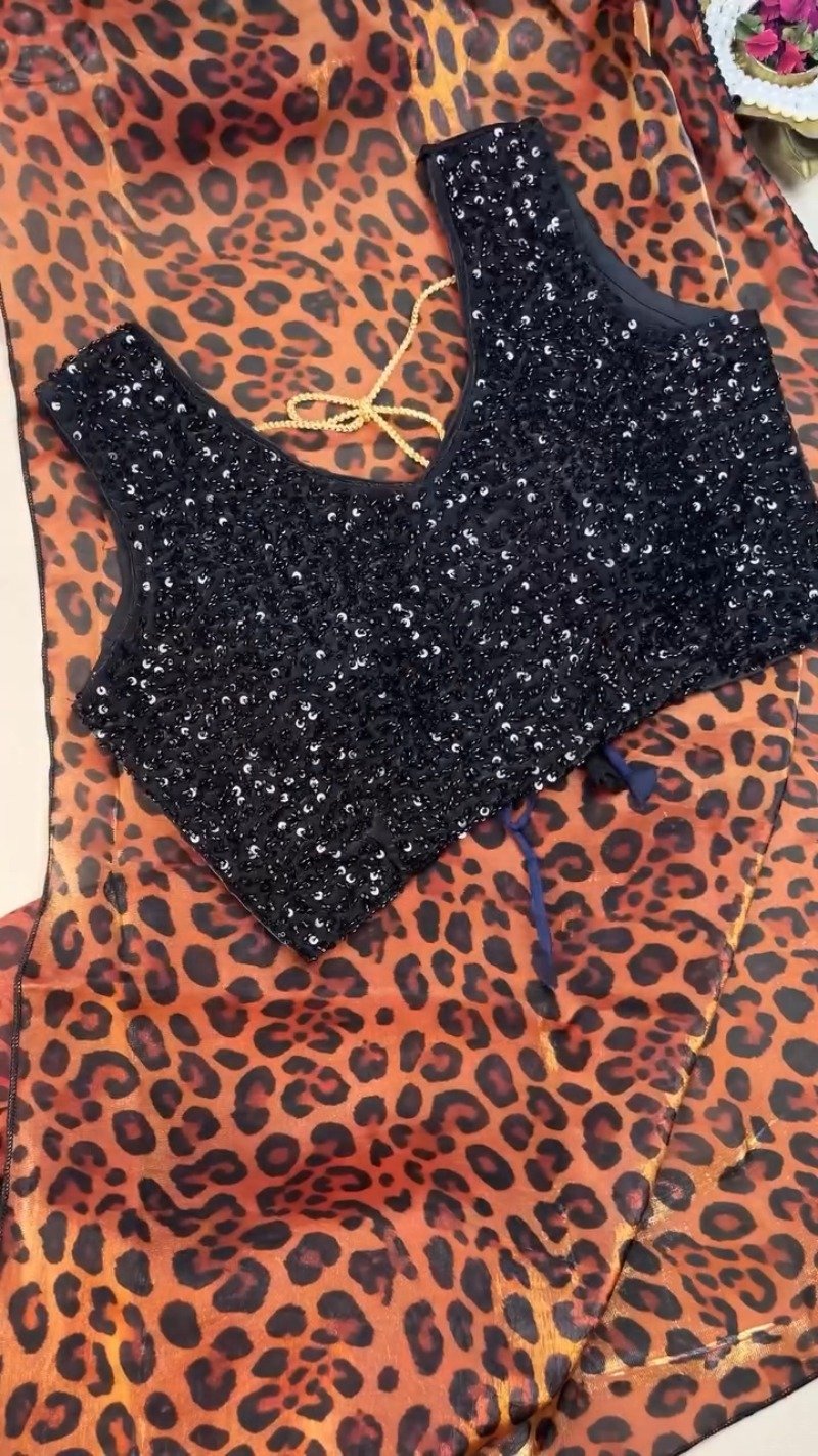 Sultry Leopard Print Organza Saree with Embellished Sequin Blouse