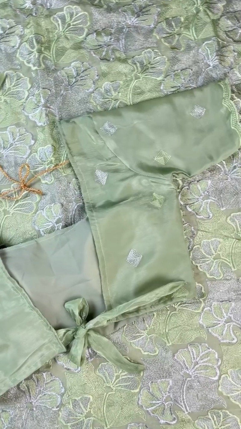 Ethereal Sage Green Embroidered Chanderi Saree with Tie-Back Blouse