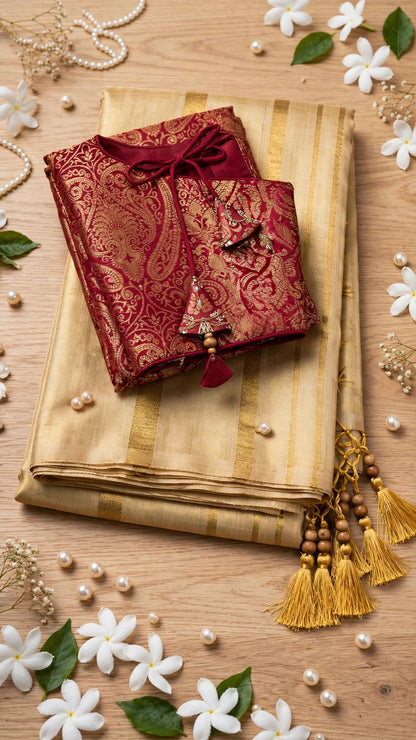 Gilded Grace Silk Saree with Maroon Brocade Blouse – A Traditional Masterpiece