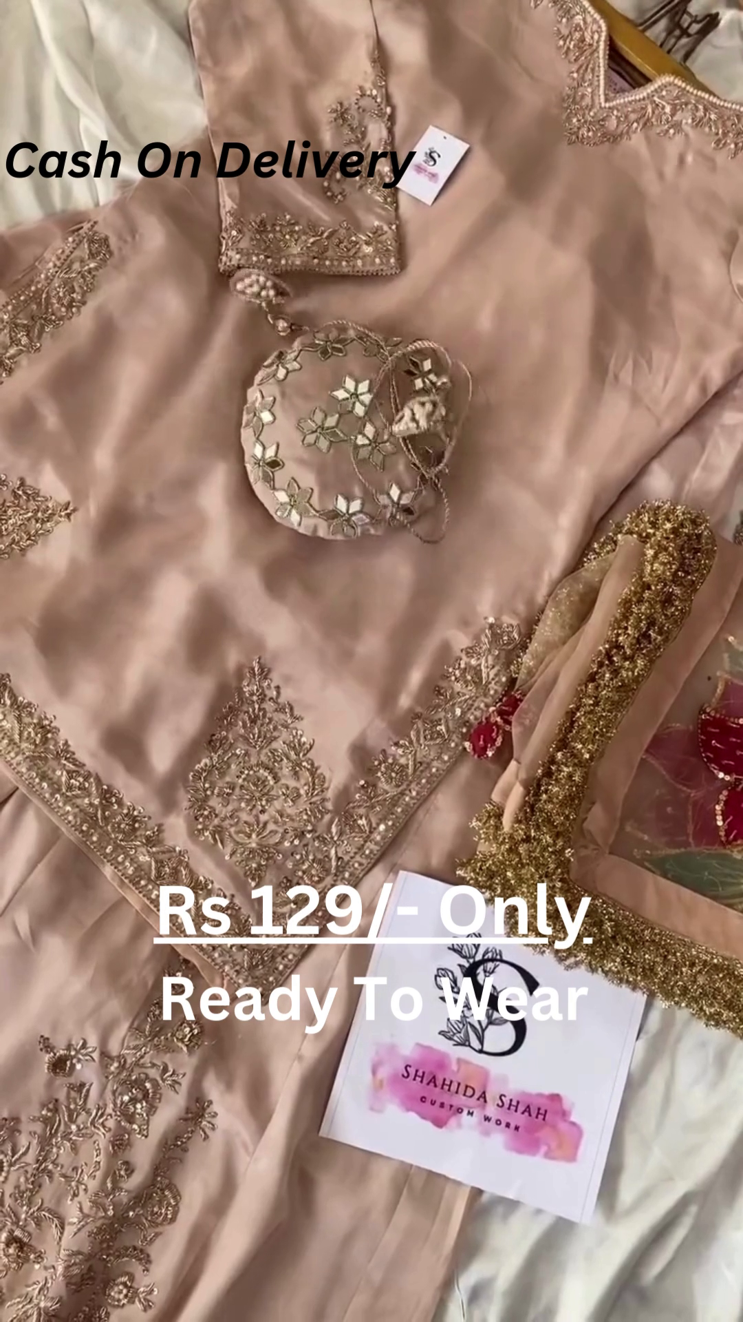 Rose Gold Splendor: Embroidered Silk Suit with Potli Bag